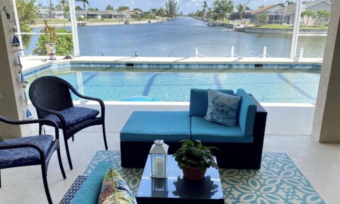 Caloosahatchee House | Luxury Waterfront Retreat-Heated Salt Pool Screened, Pedal Boat, Kayaks & Bikes