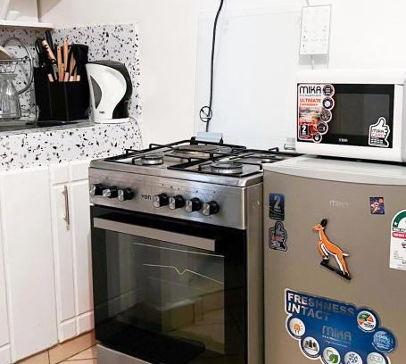 Mbotela Apartment | M studio Apartment - Centrally Located with Ordho Bed in Nairobi