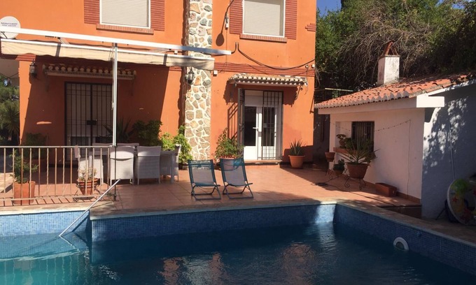 Huetor Vega House | Magnificent villa with 4 bedrooms, two bathrooms, kitchen, living room 2 porches, pool and field. Two little kids from the casino of granada, 10 minutes from the center of the city of granada and 20 minutes from sierra nevadas, without forgetting that the