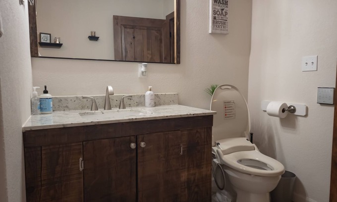 Pinehurst Condo | Main floor studio well-furnished room. Unit 2 with bath/shower bidet toilet