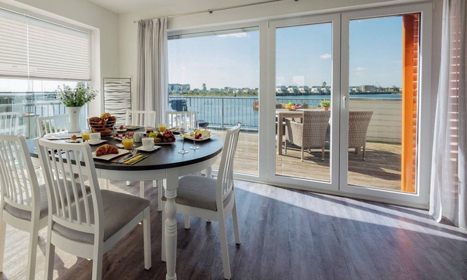 Olpenitz Apartment | Maisonette apartment Ostseeflair by Seeblick Ferien ORO, first row of water, E-pillar
