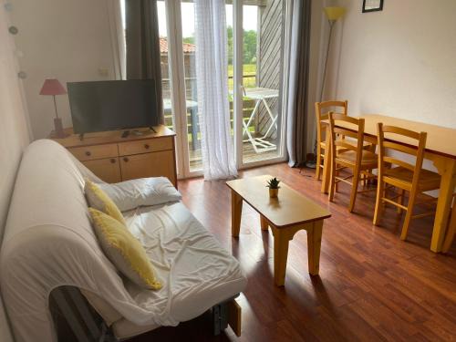 Cassen Resort | Maisonnette avec terrasse village vacances, Draps en option