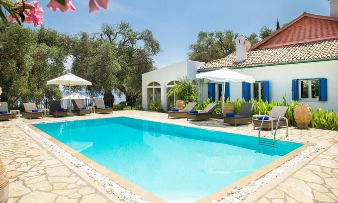 Barbati Villa | Majestic Beach Front Villa, 10 mins walk to Barbati Village, A/C, Private Pool, Sea Front Patios!