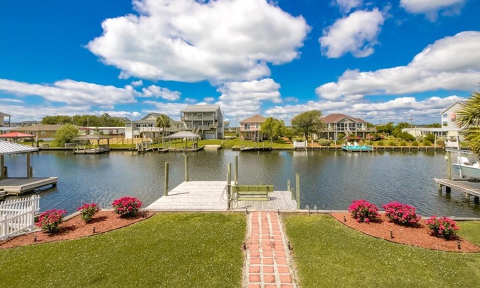 Surf City Condo | Mama's Pride - 3BR Home on the Canal - Boat Dock & Sound Views!