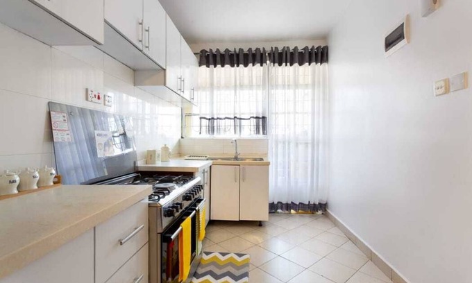Kilimani Apartment | Marilyn Monroe themed 2bed, for comfort, relaxing decor, lounge area to work.