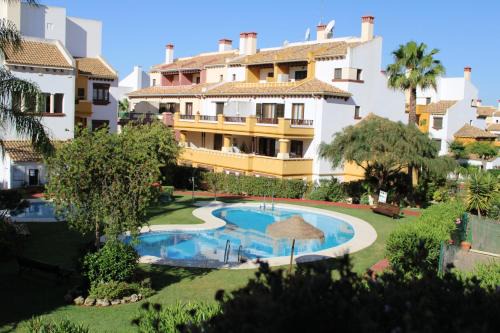 Costa Esuri Apartment | Marina Esuri. Bonito apartamento junto al Algarve portugués y 10 minutos de Isla Canela.