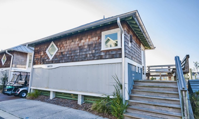 Bald Head Island Cottage | Marina view one bedroom cottage close to amenities on BHI. Walking distance to the NC lighthouse