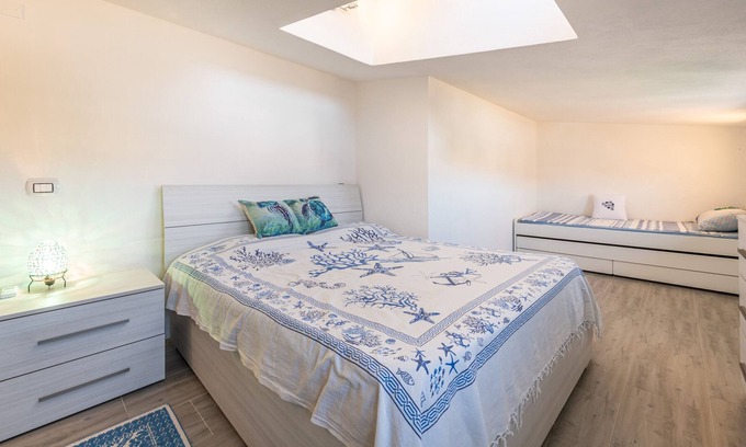 Villaggio delle Mimose Apartment | 'Marine Style Apartment' with Mountain View, Whirlpool & A/C
