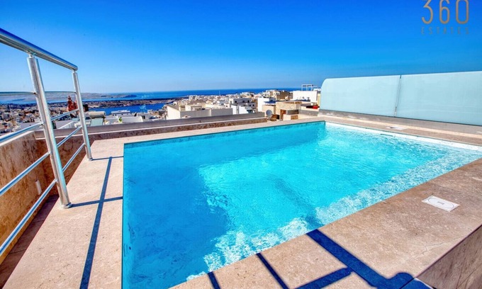Mellieha Apartment | Mellieha 3BR home with Rooftop Pool Access w/AC's