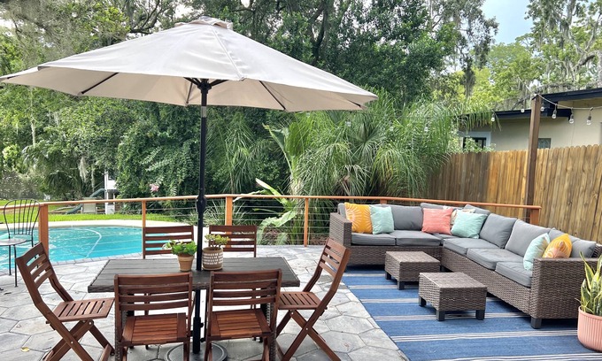 Lakewood House | Mid-Century Boho Chic home with Pool, Game Room & Outdoor Playhouse.