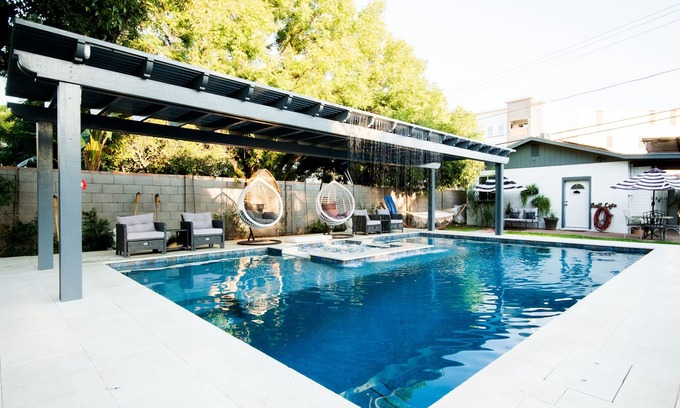 Woodlea Cottage | Midtown Detached Studio Cottage-Heated Pool & Hot Tub-Covered-Gated Parking