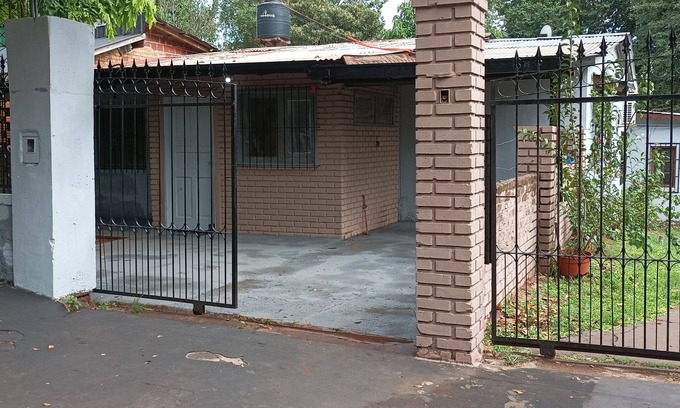 Puerto Iguazu Apartment | Mini vacational house. quiet, in the center with kitchen and parking.