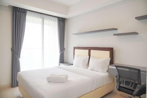 Pantai Indah Kapuk Apartment | Minimalist and Nice Studio at Gold Coast Apartment By Travelio