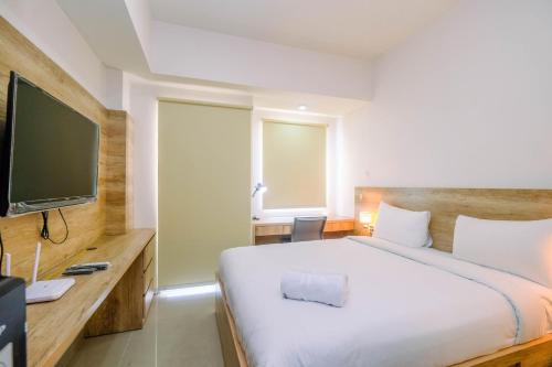 Cikarang Apartment | Minimalist Mustika Golf Residence Studio Apartment with City View By Travelio