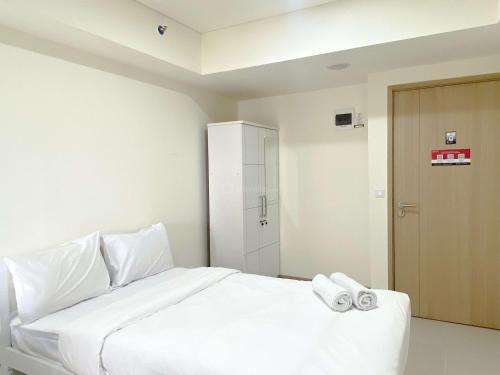 East Jakarta Apartment | Minimalist Studio for 1 Pax at Meikarta Apartment By Travelio