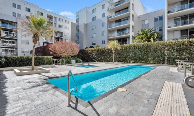 Reid Apartment | Modern 1-Bed Unit with Pool Views and Balcony