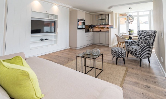 Wenningstedt-Braderup Apartment | Modern 2-room vacation apartment with balcony, by the village pond.