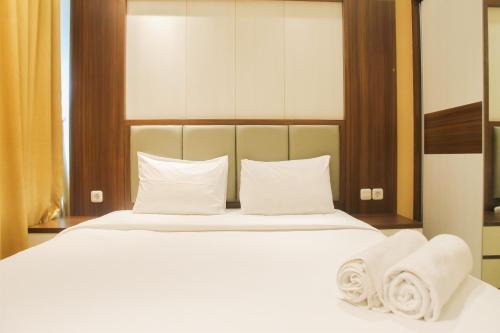 Bekasi Barat Apartment | Modern 2BR Grand kamala Lagoon Apartment By Travelio
