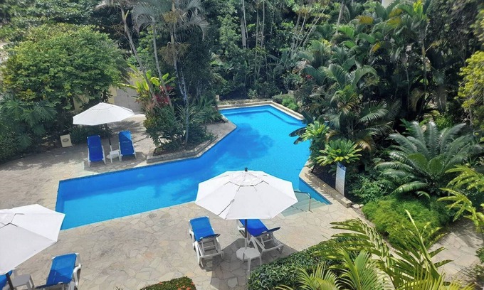 ProCab Apartment | Modern 2BR – Poolside Escape, Walk to Beach, Kids-Friendly Stay