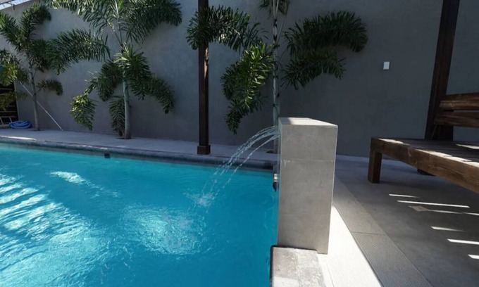 Eden Gardens Apartment | Modern 2BRPenthouse with Swimming Pool near Devon House! Central Location.