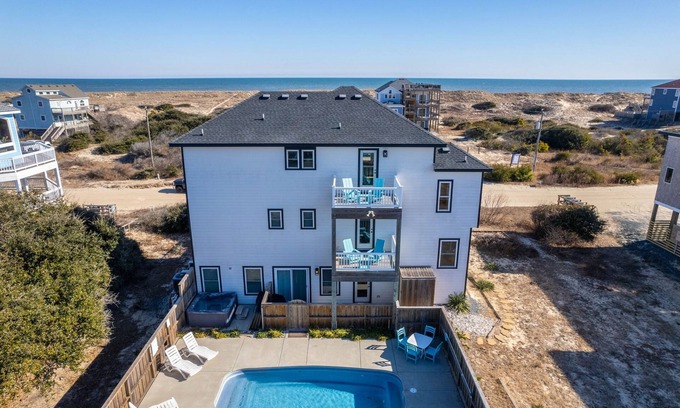 Carova Beach House | Modern 5br beach retreat with ocean views and salt water pool.