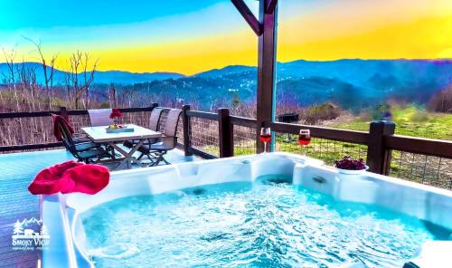 Gatlinburg - Pigeon Forge House | Modern 6 Bed 5 Bath CABIN AMAZING LOCATION & PRIVACY! -4 Miles to Gatlinburg-7 to Dollywood-Hot Tub-Fireplace-King Suits-Deck-Grill-Free Parking for 10 Vehicles-Firepit-Fully Stocked Kitchen-Theater-"Smoky View Cabin"