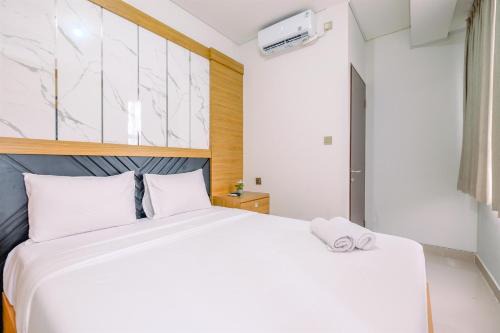 Depok Apartment | Modern and Comfort 2BR Transpark Cibubur Apartment By Travelio