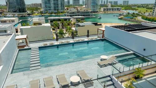Zona Hotelera Apartment | Modern Apartment with Marina & Beach Access
