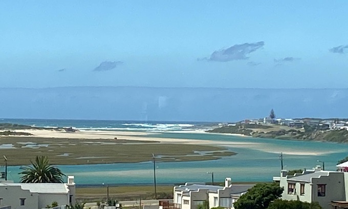 Still Bay Apartment | Modern apartment with sea, river & garden view in charming Still Bay. No smoking