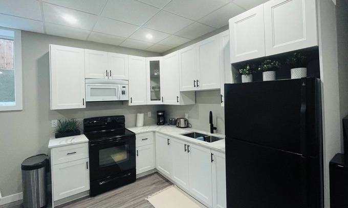 Brandon Apartment | Modern Basement Suite