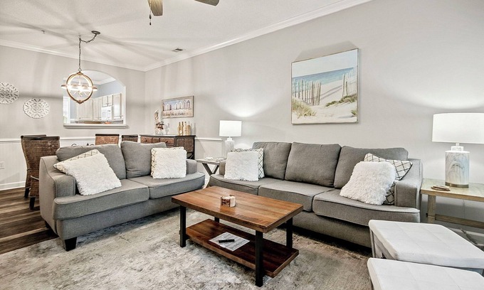 North Myrtle Beach Condo | Modern condo across from pool, near beach and on 9th hole of Norman golf course!