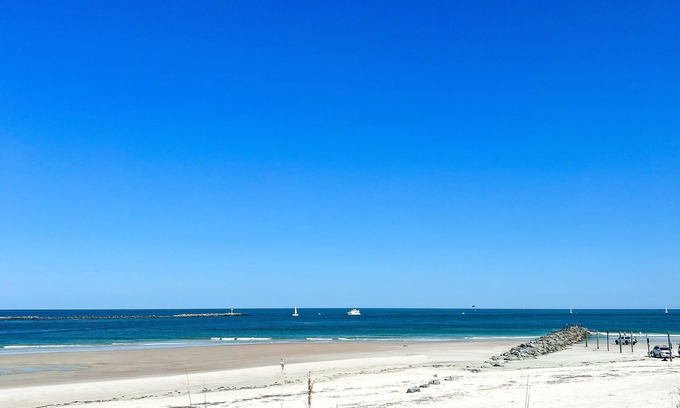 New Smyrna Beach Condo | Modern Décor, Great Pool and Ocean Views from Your Own Balcony