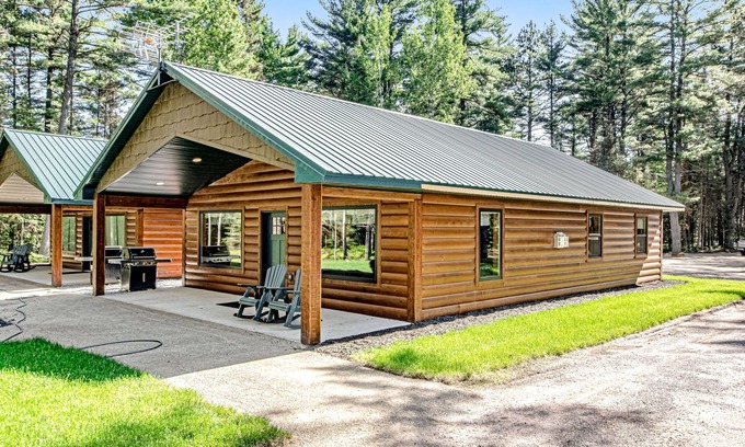 Conover House | Modern dog-friendly cabins with hot tub, fireplace, patio, grill, central AC, & W/D
