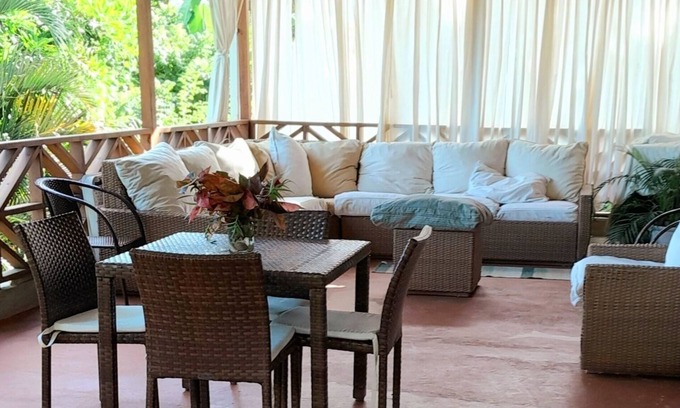 Saint Sylvans Cabin | Modern Eco lodge with A/C in bedrooms and 40ft patio for relaxation and fun.