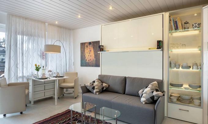 Schoenwald Apartment | Modern Holiday Apartment “Urs” with Mountain View, Balcony, Sauna & Pool