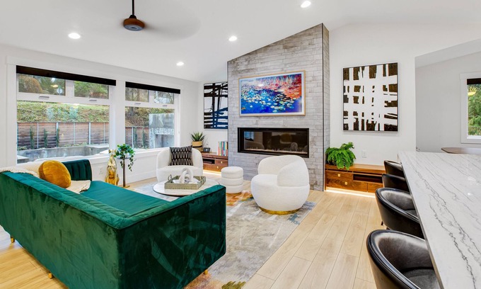 Milton House | Modern home with outdoor fireplace, rock-wall, & walk-in shower