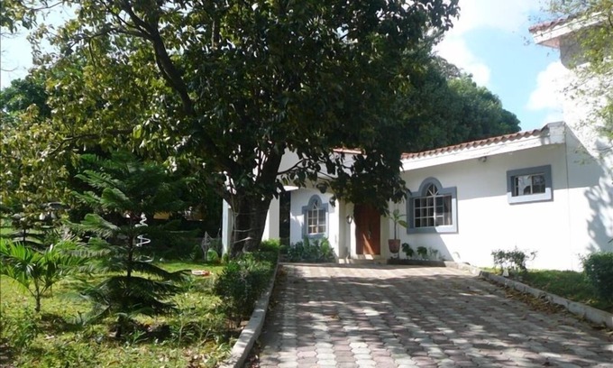 Managua Villa | Modern House in Managua Suburbs, Within a Lush Garden Setting.