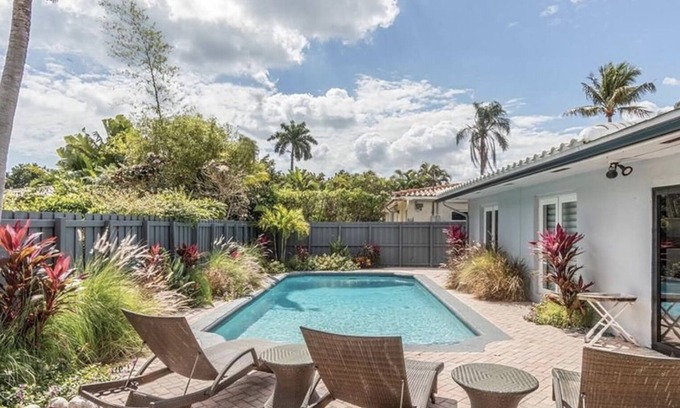 Dolphin Isles House | MODERN LUXURY: 4 Bedroom Heated Pool Home! Walk to beach & Restaurants!