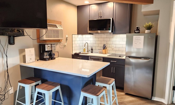 Mancelona Condo | Modern NEW renovated bathroom, WIFI, Pool, new kitchen Summer of 24! sleeps 4.