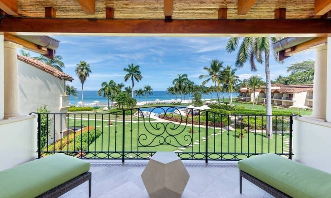 Playa Flamingo Condo | Modern Oceanfront Condo with a Chic Coastal Design, Resort-Style Amenities, and
