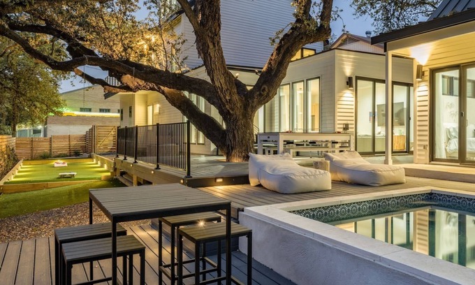 Bouldin Cottage | Modern Retreat w/Pool, Guest House & Deck Lounge Henley by Avantstay