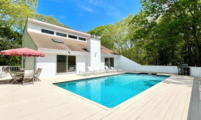 Springs House | Modern & Spacious, Heated Pool, Gas Grill, Wine Cellar. Bike To Sandy Beaches!