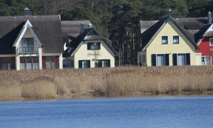 Breege House | Modern Thatched Cottage on the water with water views