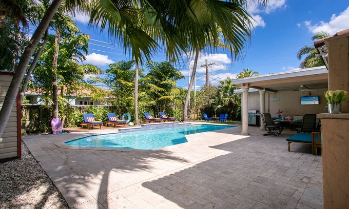 Dania Beach House | Modern Tropical Villa with Heated Salt Water Pool & Hot Tub by the Beach!