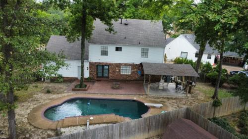 Cordova House | Modern Vast Southern Home with Pool Near Shops