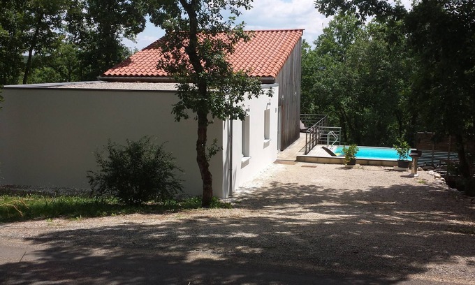 Luzech House | Modern wooden house with tree terrace and private heated pool