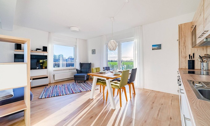 Greetsiel Apartment | Moderne Ferienwohnung "köken" mit Blick auf die Greetsieler Zwillingsmühlen