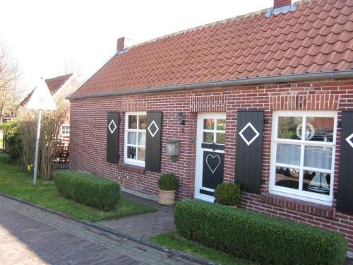 Rysum House | Modernisiertes und hell eingerichtetes Ferienhaus mit eigenem Garten ideal für Familien
