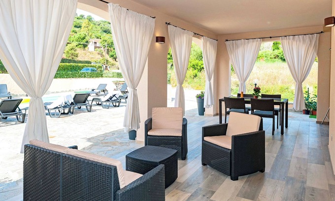 San Teodoro House | MOLAROTTO CAMERE CON ANGOLO COTTURA
