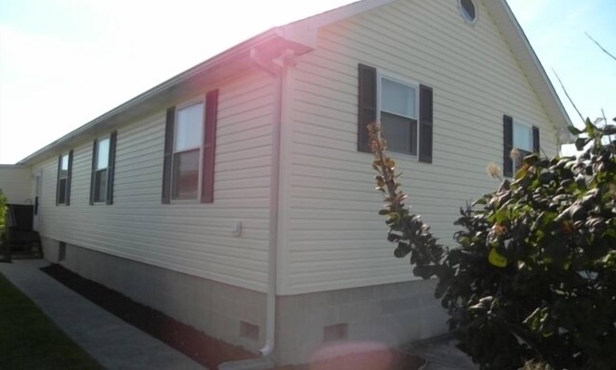 Montego Bay House | Montego Bay Community BAY VIEW 4 BR 2 Bath w/screened porch! 2 large community pools & tennis